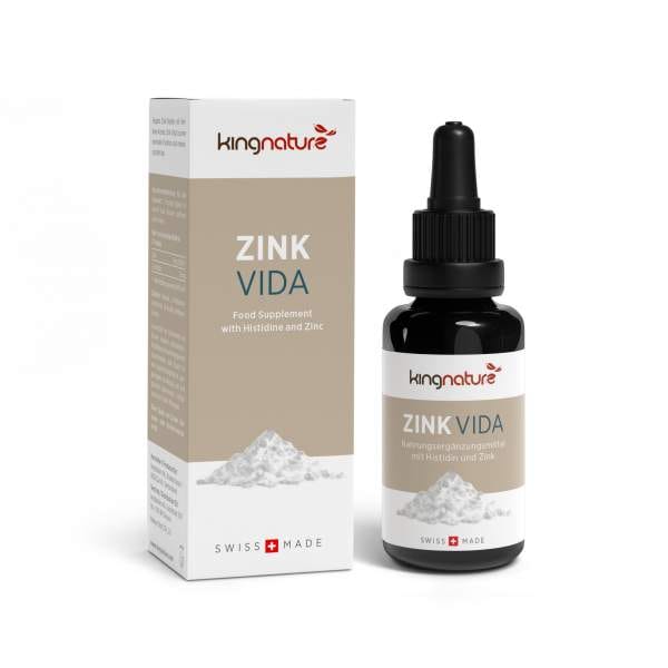 Eine Schachtel und eine Tropfflasche mit dem Nahrungsergänzungsmittel Zink Vida, das Histidin und Zink enthält. Die weiße Verpackung mit beigen Akzenten trägt das Swiss Made-Logo und den Hinweis „Zink-Tropfen“ zur bequemen Dosierung.