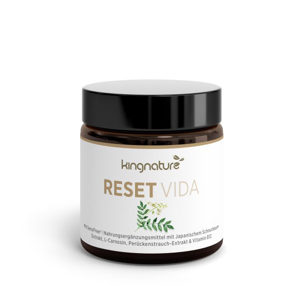 ResetVida_Jar_Front_v1.0 Ein braunes Glas mit schwarzem Deckel und der Aufschrift „Reset Vida“. Das Etikett zeigt grüne Blätter und weist darauf hin, dass es sich um ein Nahrungsergänzungsmittel mit japanischen Rosinen, L-Carnosin und Vitamin B12 handelt.